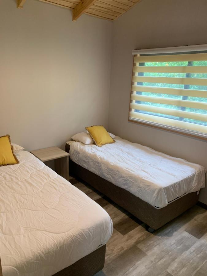 Cabanas Alto Bosque ปูกอน ภายนอก รูปภาพ